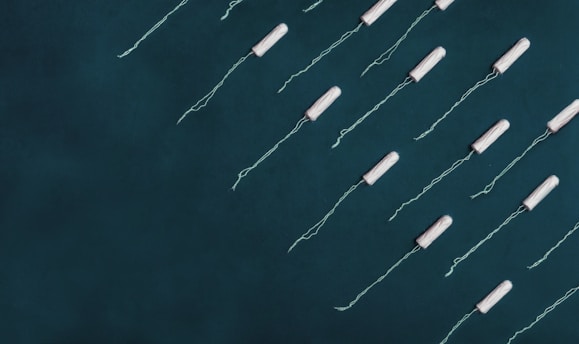 white strings on blue surface