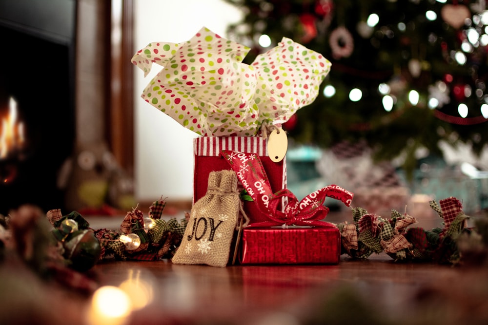 assorted Christmas decors on brown floor