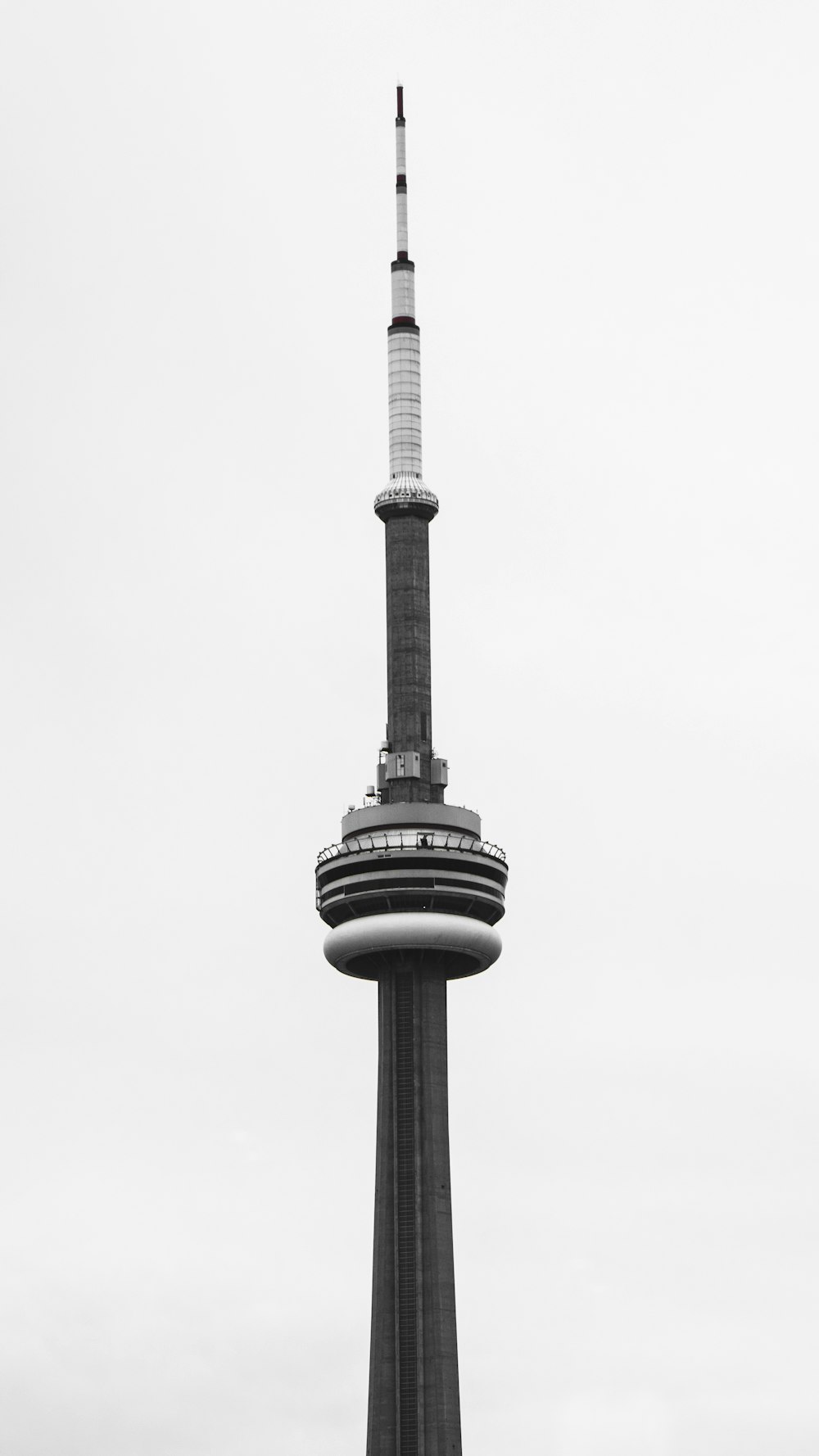 greyscale photo of tower during daytime