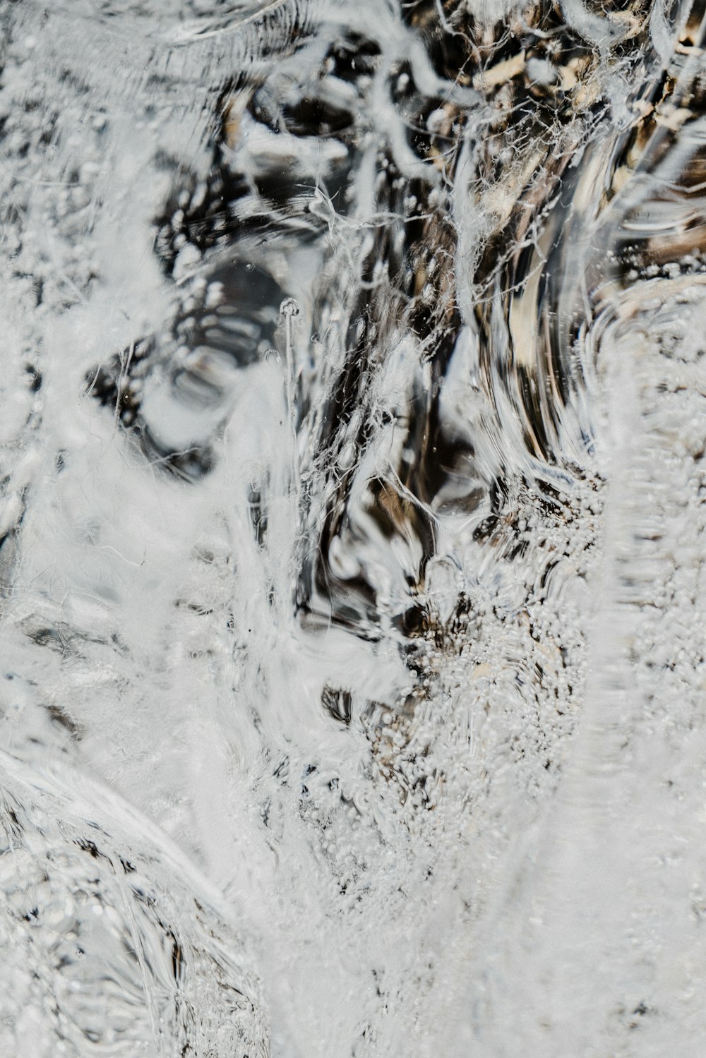 a close up view of water and ice