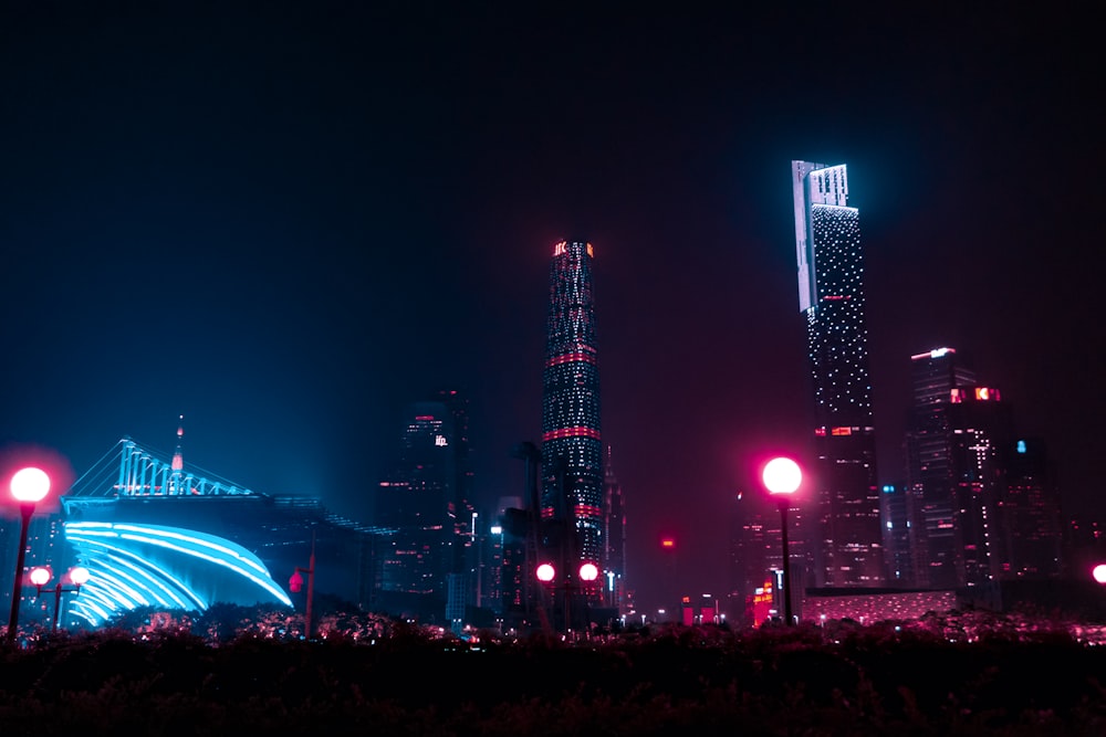 highrise lighted buildings during night time