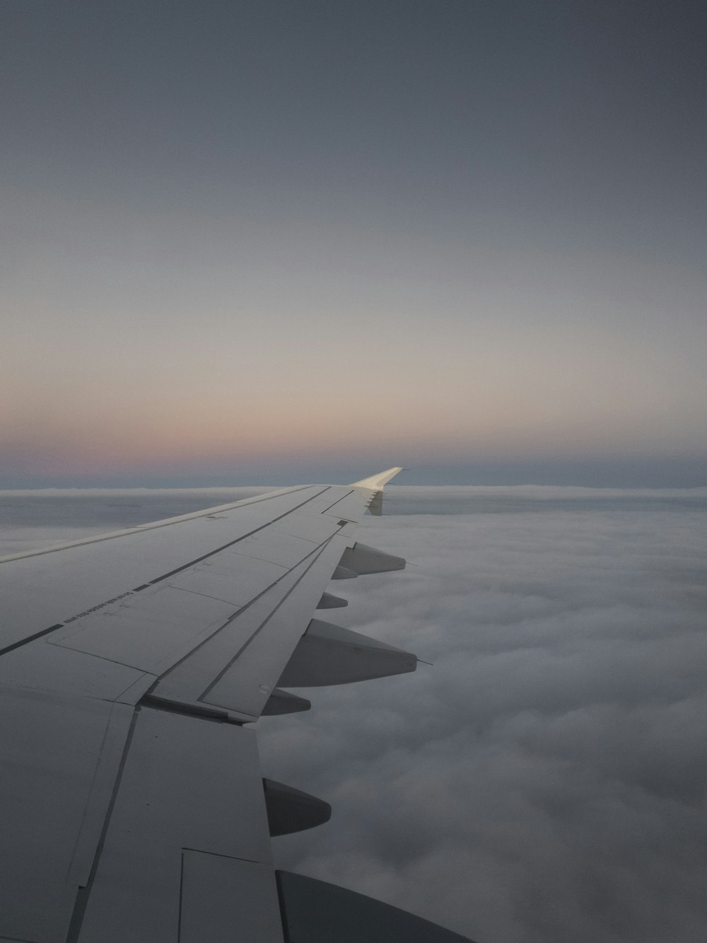 airplane window photo of left wing