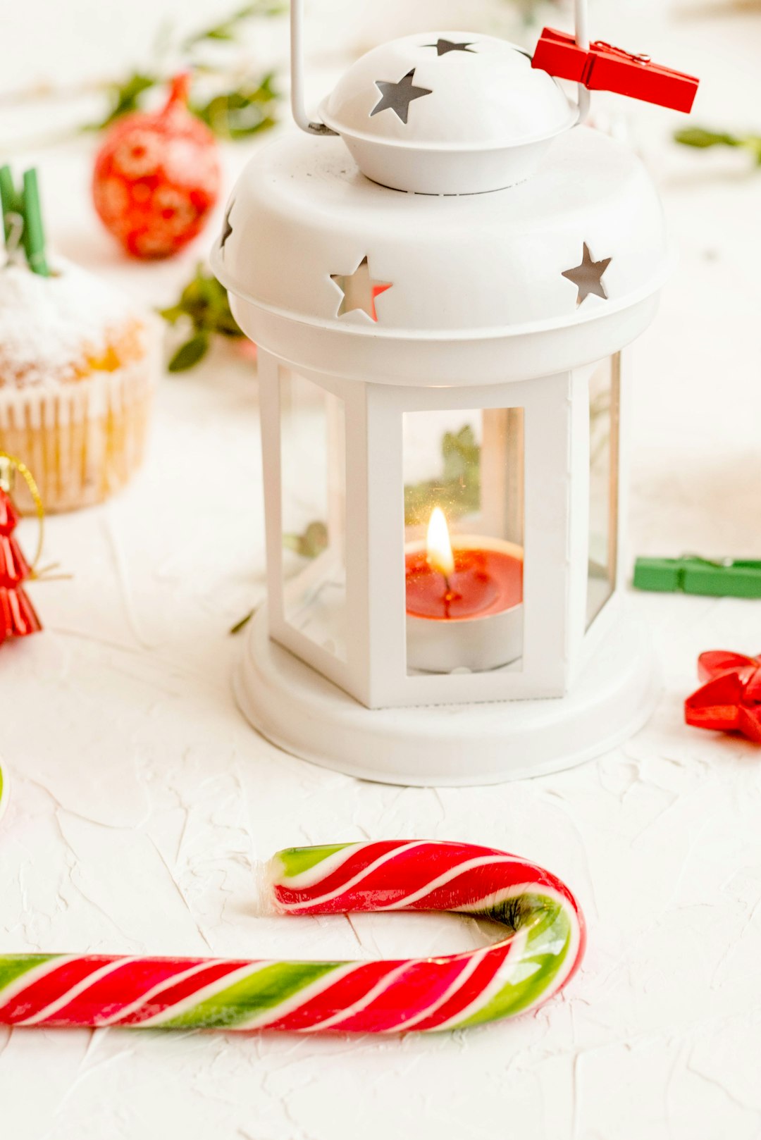 lighted tealight candle inside candle lantern