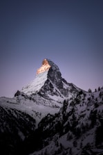 mountain coated with snow