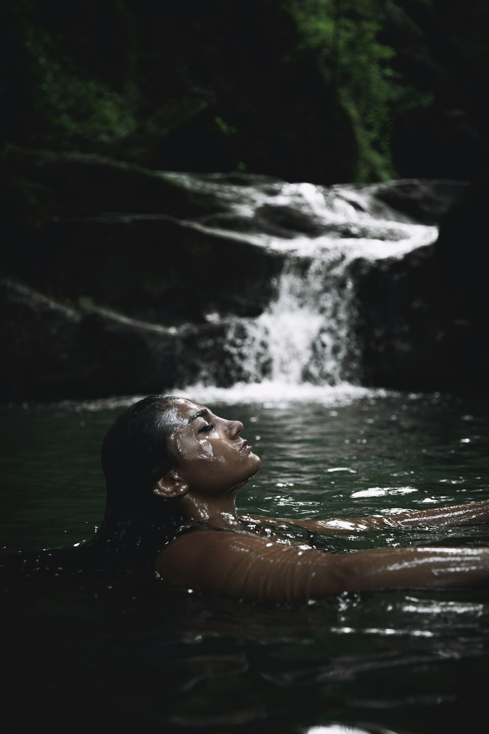 woman swimming on lake