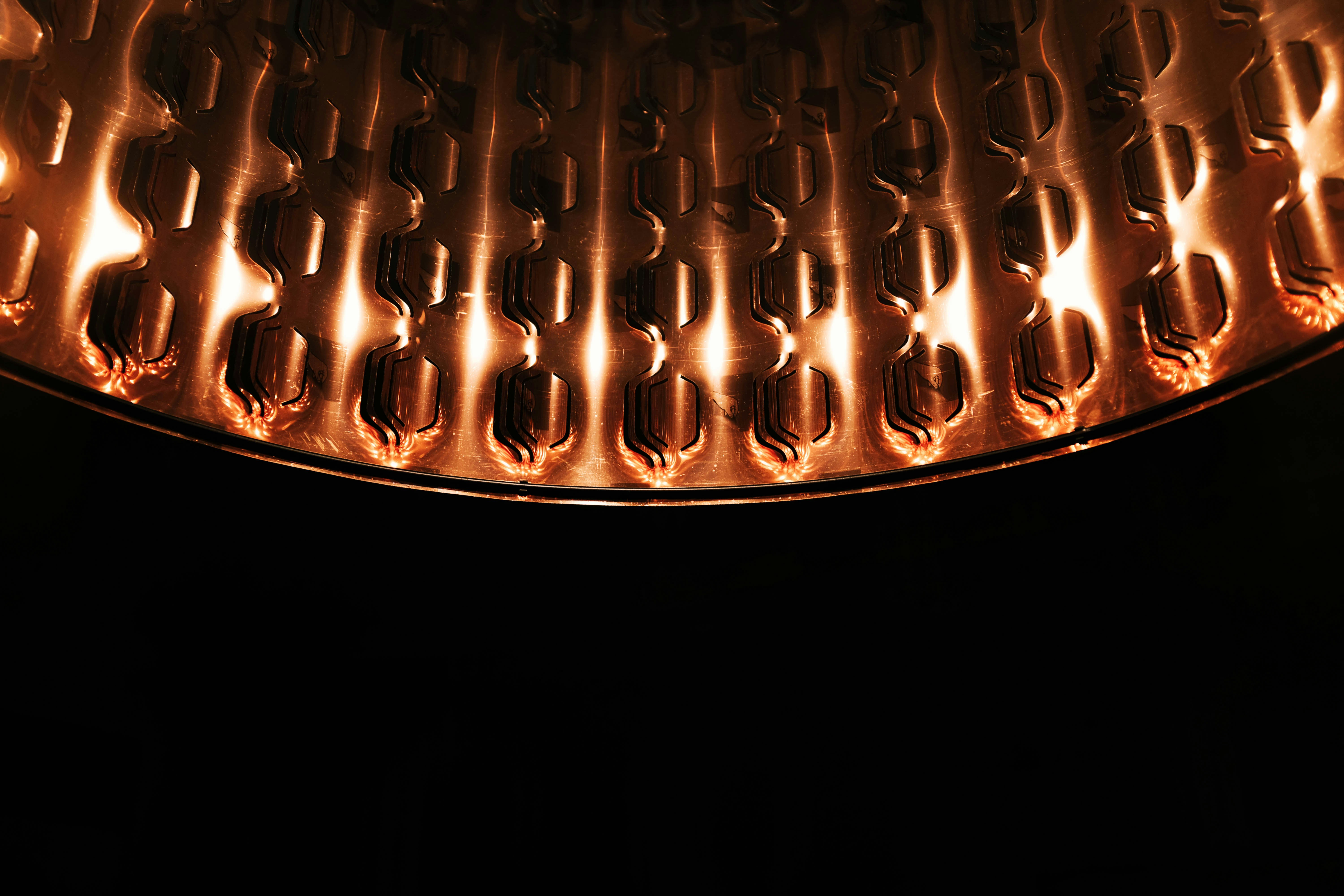 Copper surface showing antimicrobial properties, warm orange metallic texture close-up