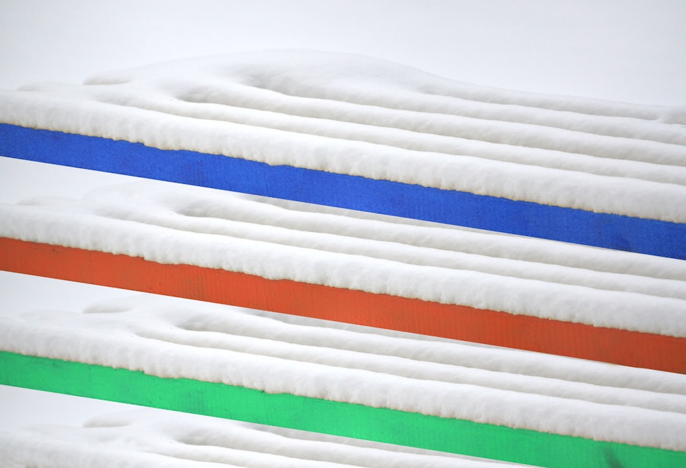 four white and multicolored mattresses