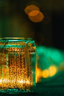 A glowing jar of ghee with a futuristic design, softly levitating with frosted glassmorphism effects.