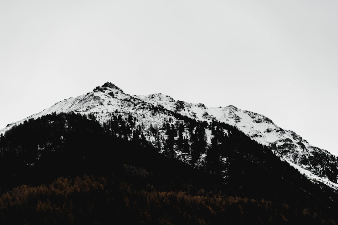 snow covered mountain during daytime