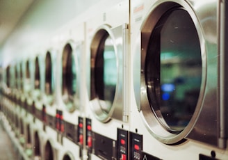 shallow focus photo of washing machines