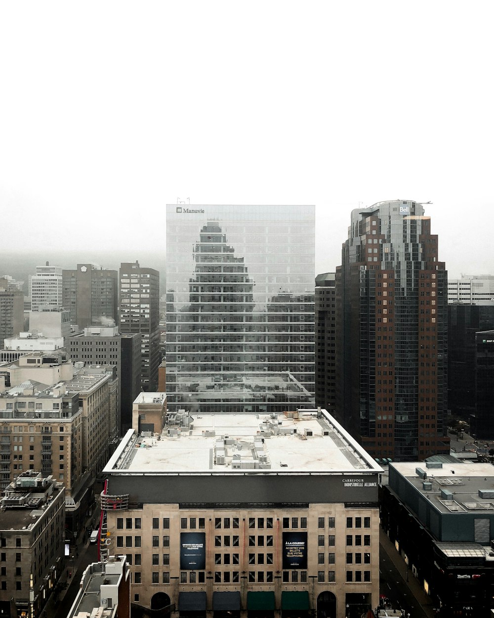 white clouds over buildings