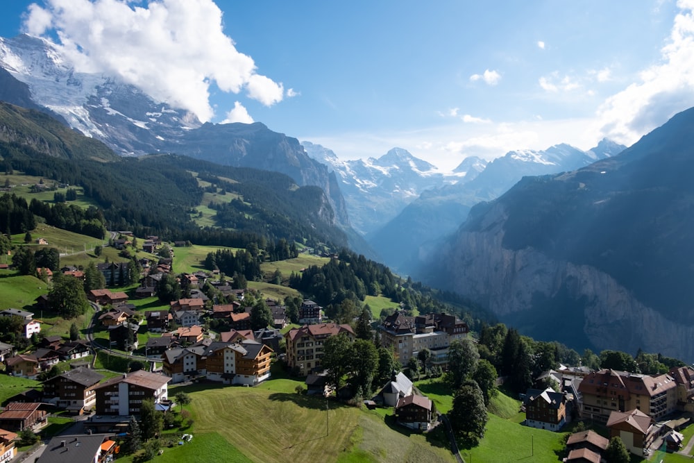 houses on mountain under blue sky