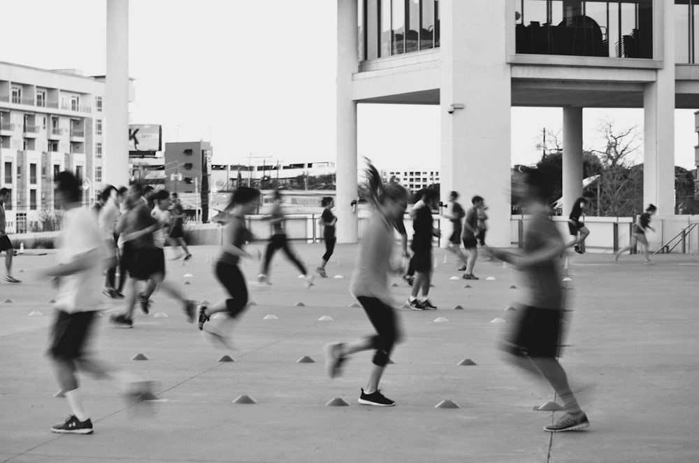 grayscale photography of people at the park