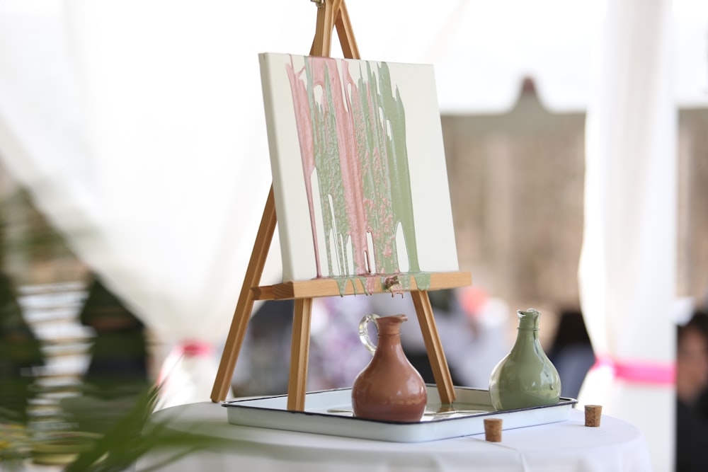 brown vase under brown easel