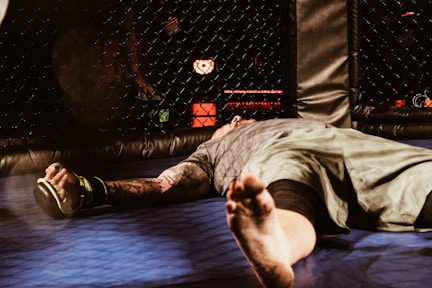 MMA Fighter Knocked Out Laying On Canvas