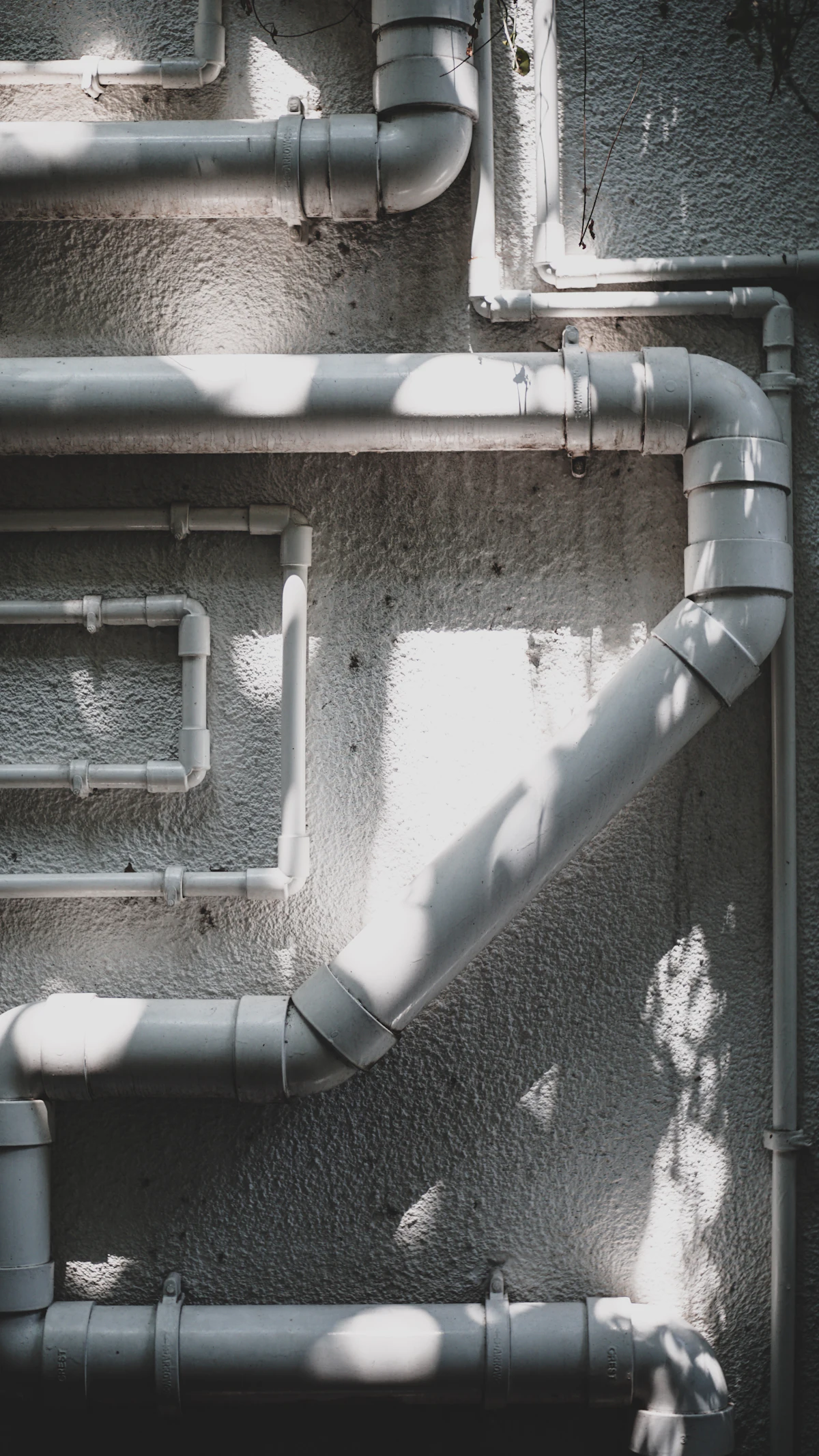 A domestic water heater and connected pipework