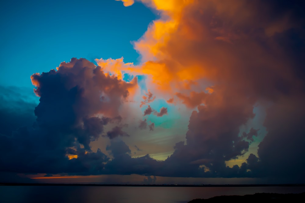 body of water during golden hour