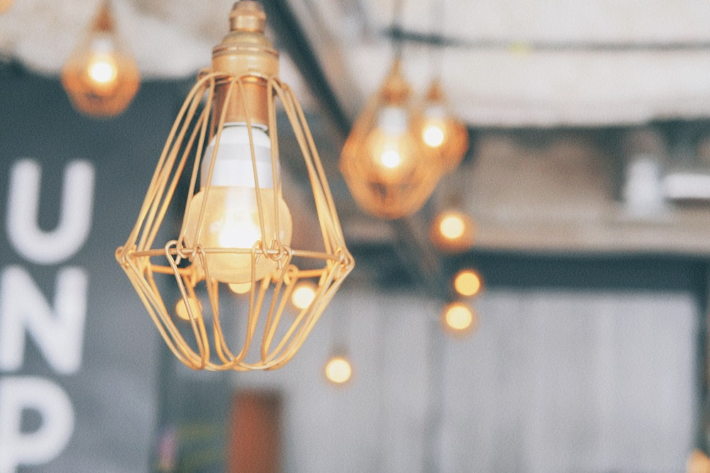 gold wire-caged pendant lamp