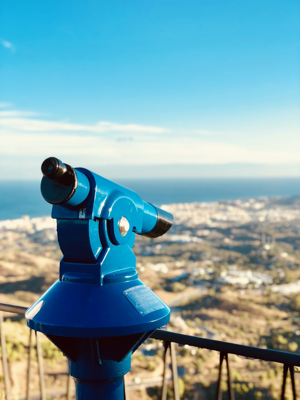 black and blue telescope \