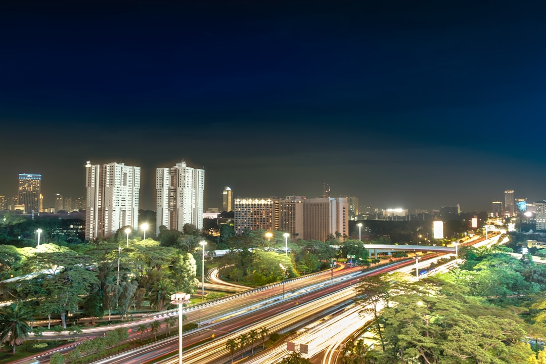 lighted city buildings during nighttime