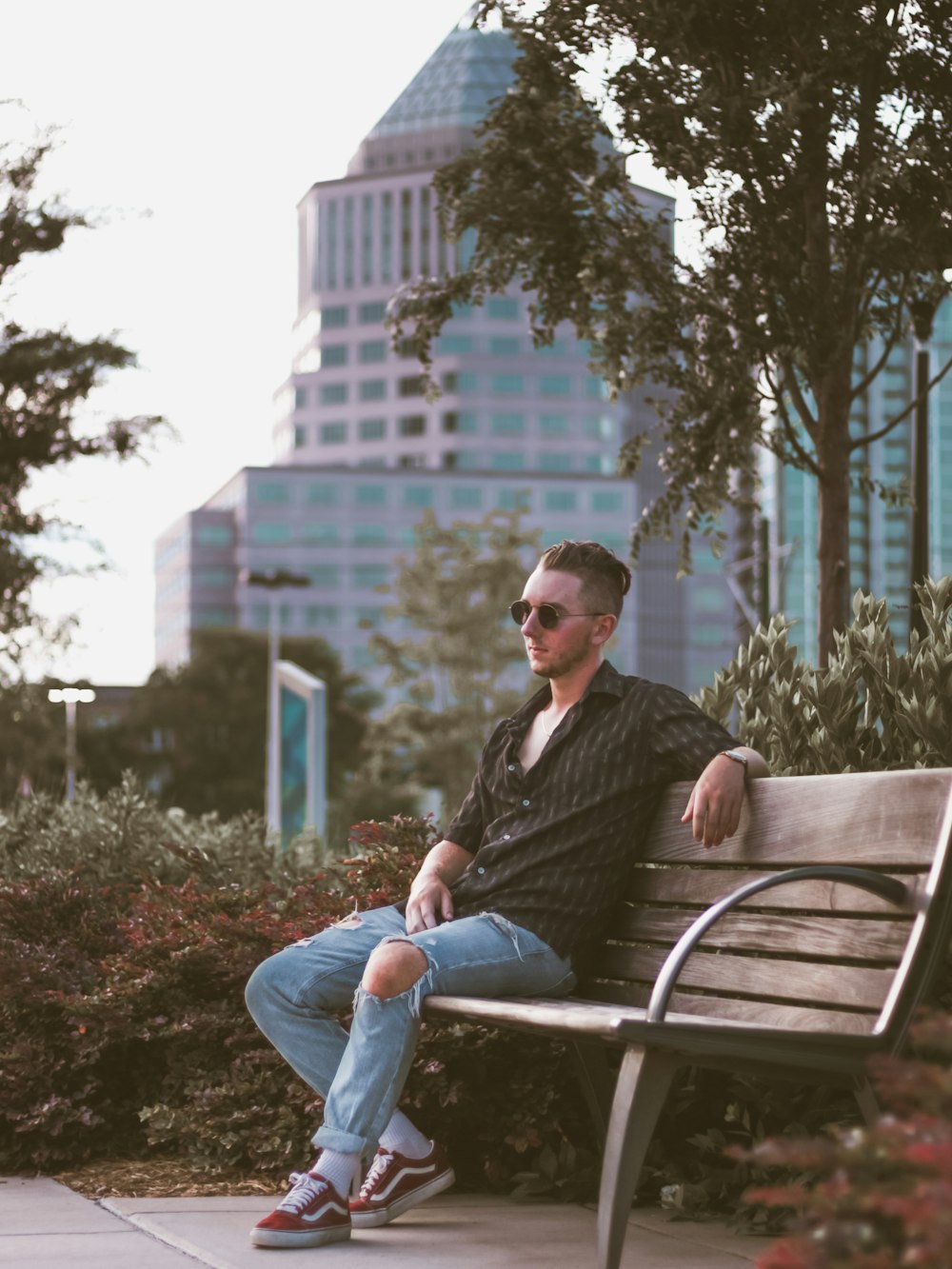 man sitting on bench