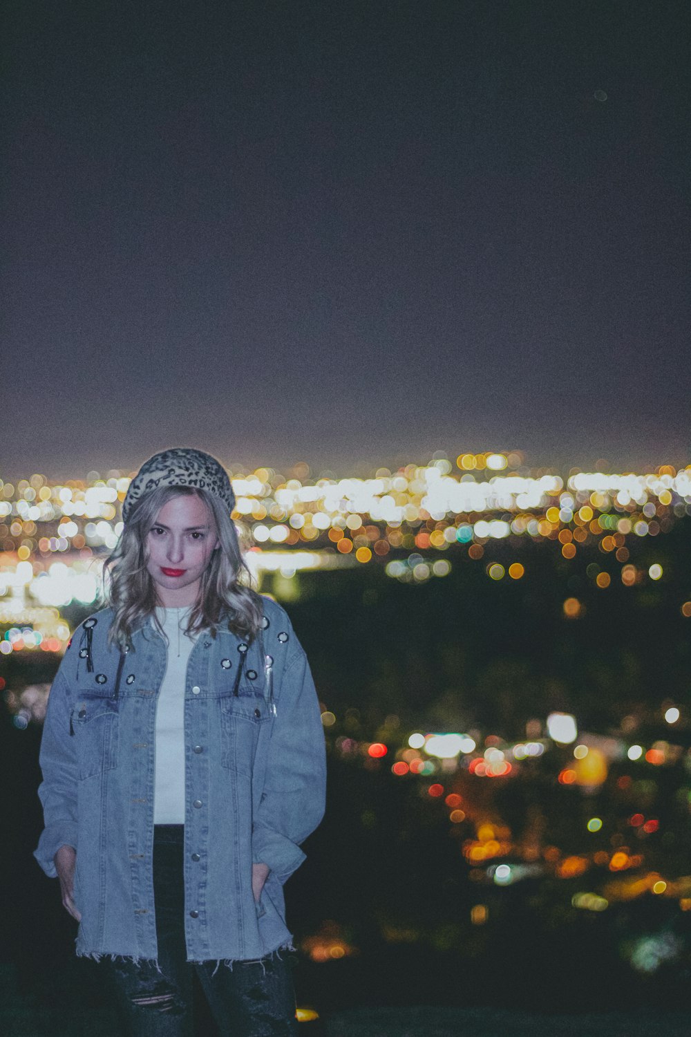 woman standing on hill