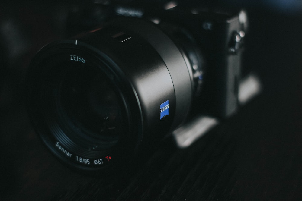shallow focus photography of DSLR camera