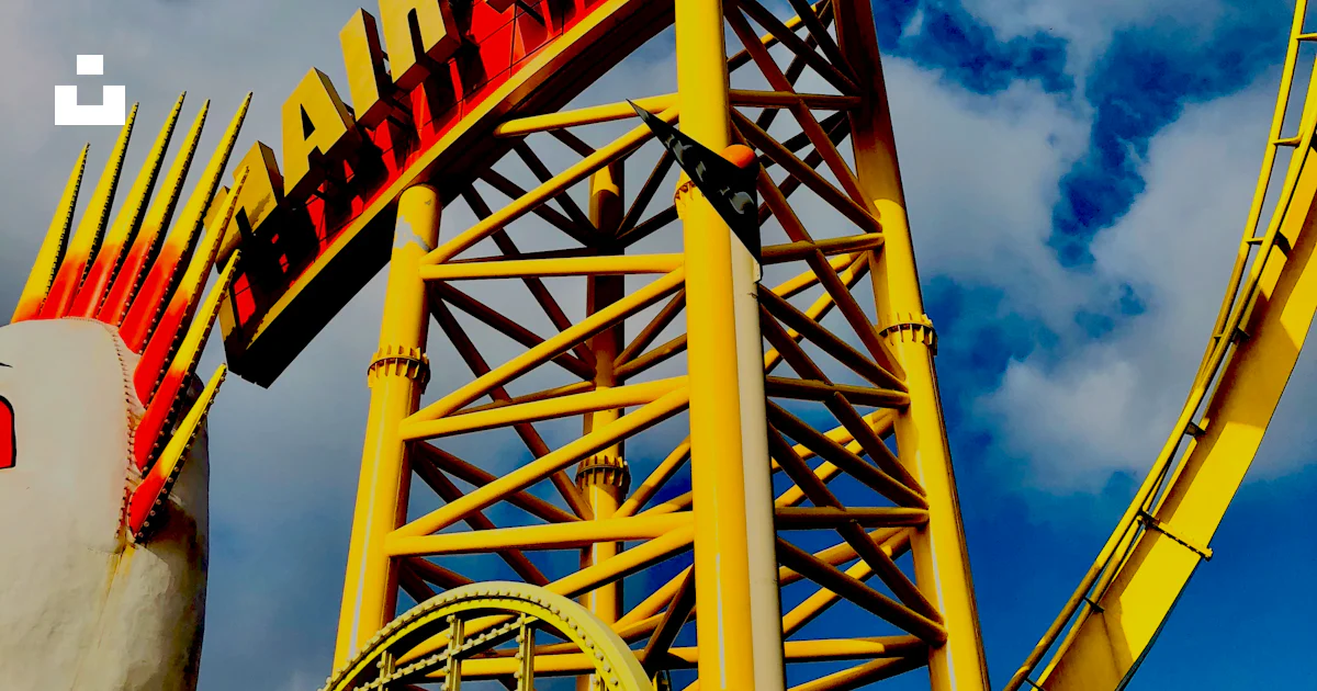 Raiser Ride Red and yellow hair raiser ride under cloudy sky photo – Free Neon ...