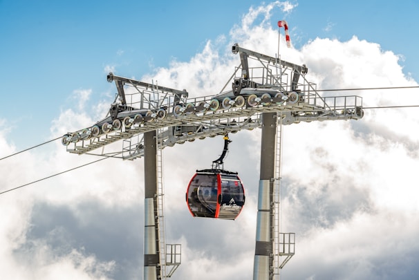 A team of professionals working on gondola assembly.