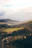 Scenic photo of a Yorkshire village with rolling hills and quaint cottages during golden hour