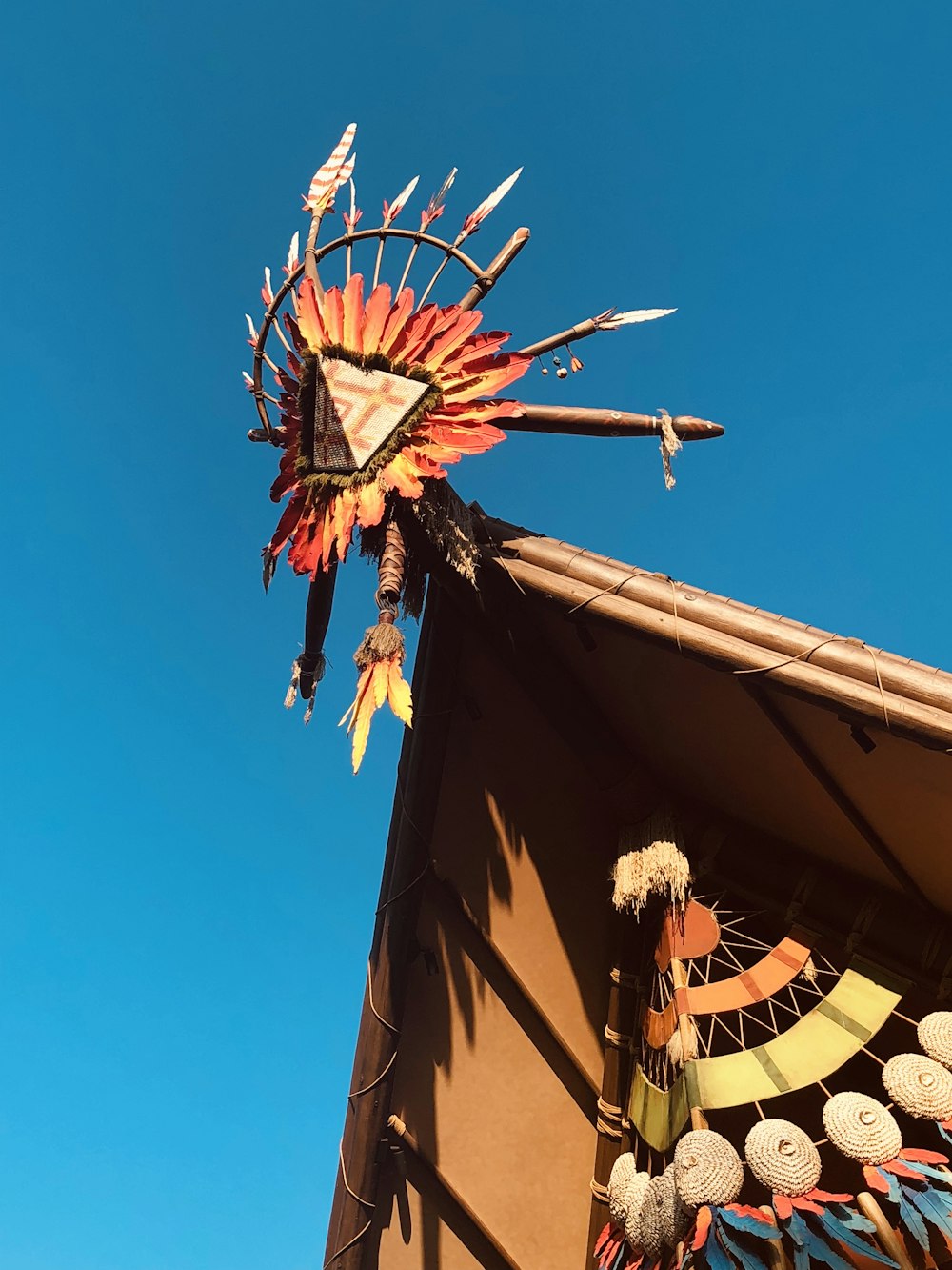 native American house roof decor during day