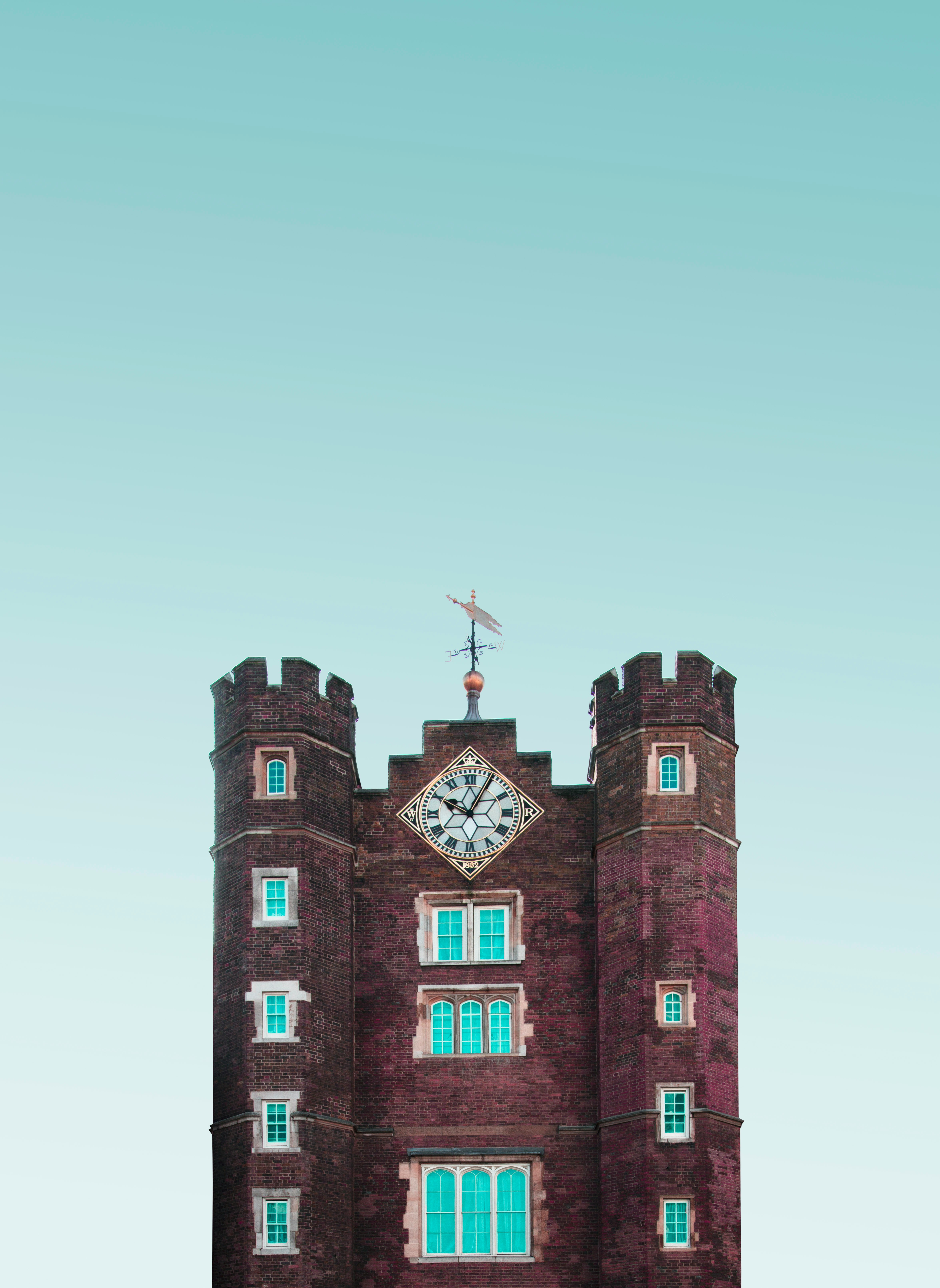 brown concrete building under blue sky