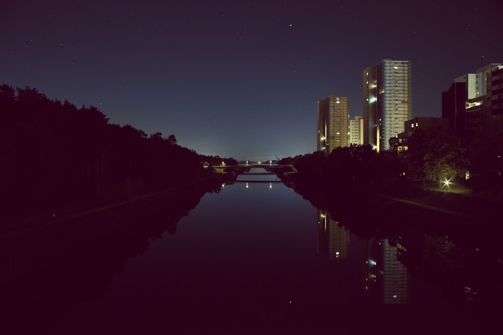 calm body of water between buildings