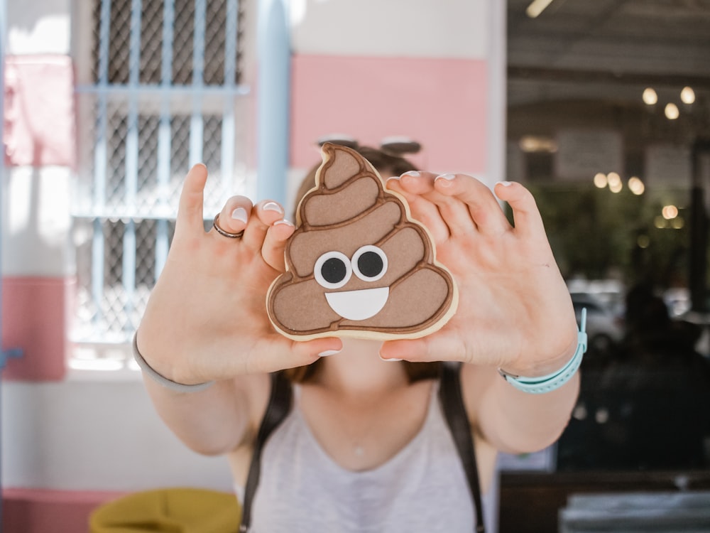 woman holding poop case