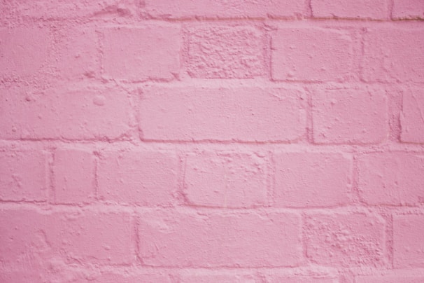 pink painted brick wall