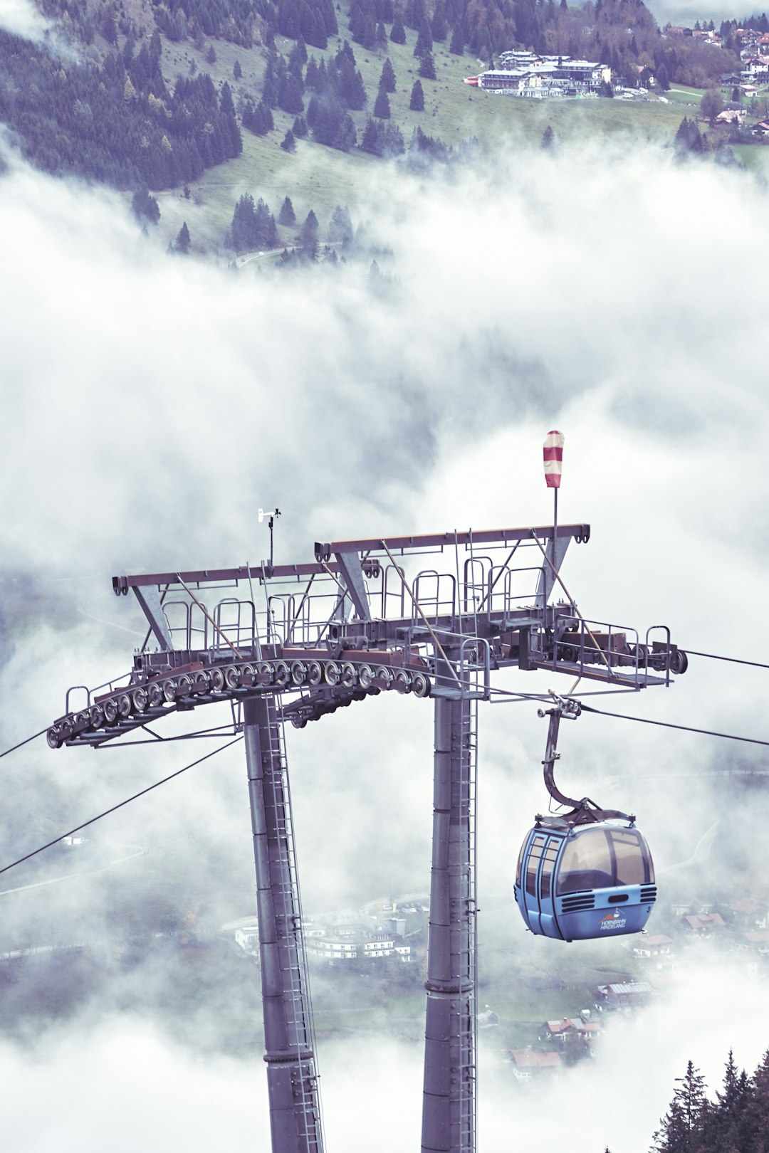 aerial photography of blue cable car