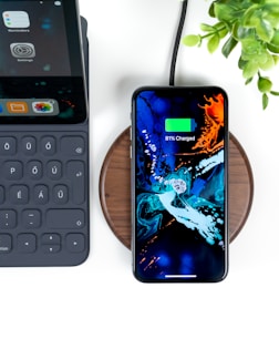 smartphone on wireless charging case at 83 percent charge