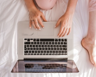 woman using MacBook Pro