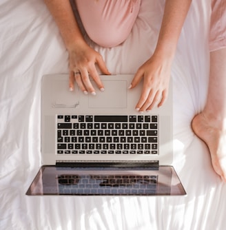 woman using MacBook Pro