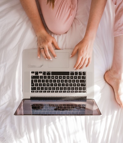 woman using MacBook Pro