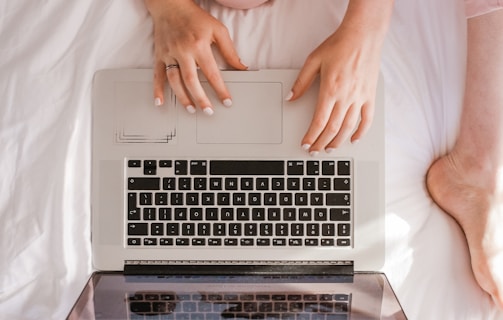 woman using MacBook Pro