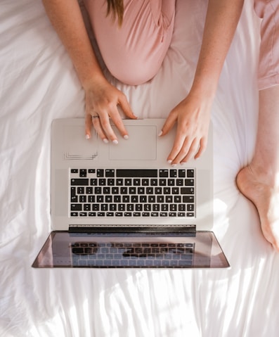 woman using MacBook Pro