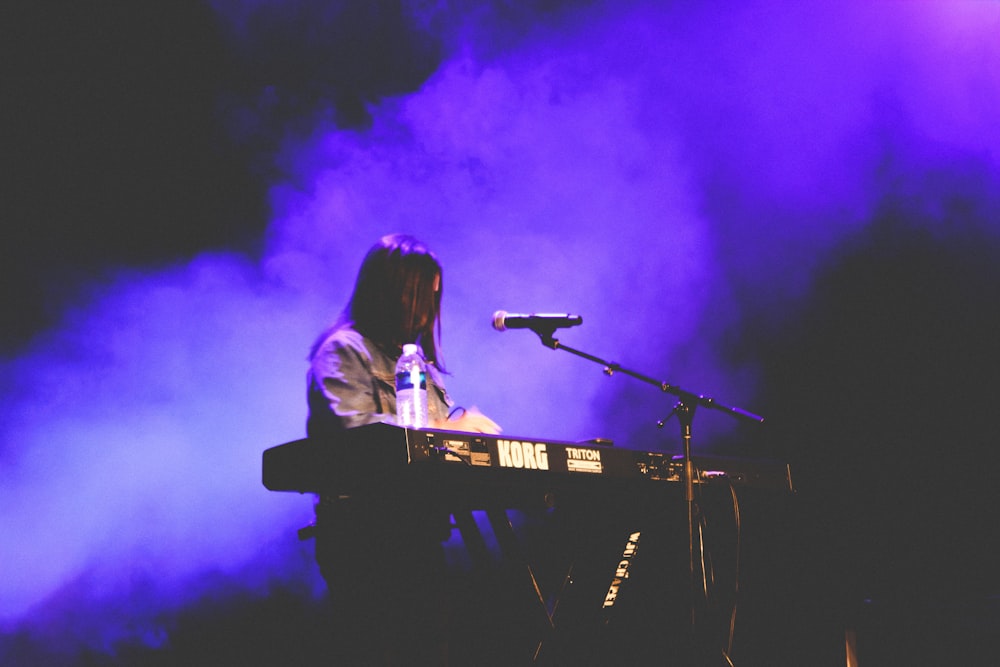 woman playing electronic keyboard