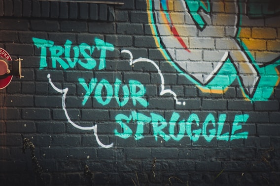 green trust your struggle graffiti