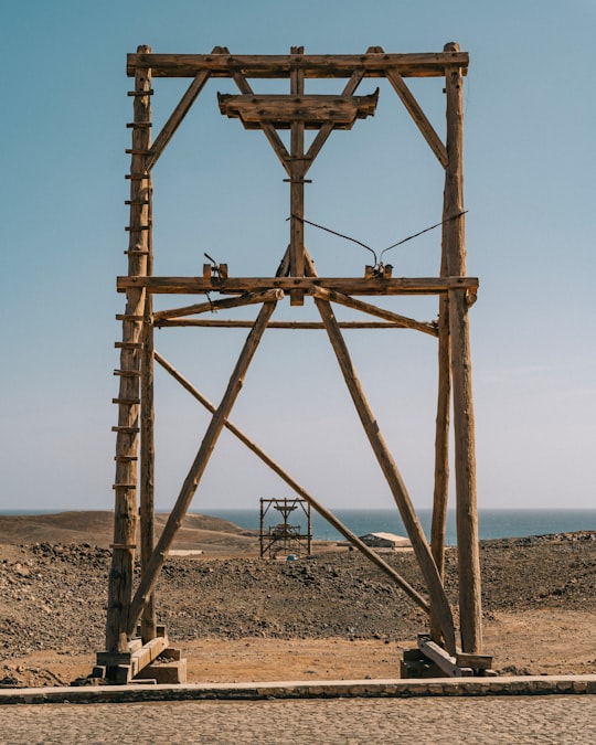 brown wooden scaffolding at daytime in Pedra de Lume Cape Verde