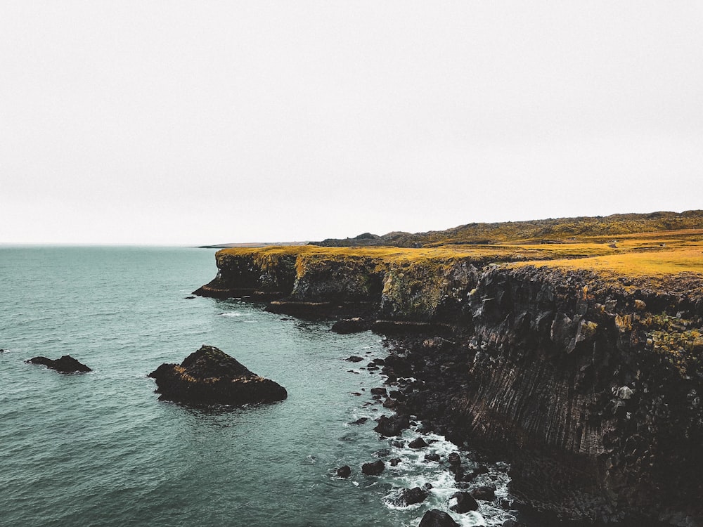 beach cliff viewing calm sea