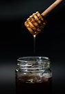 brown wooden honey dipper