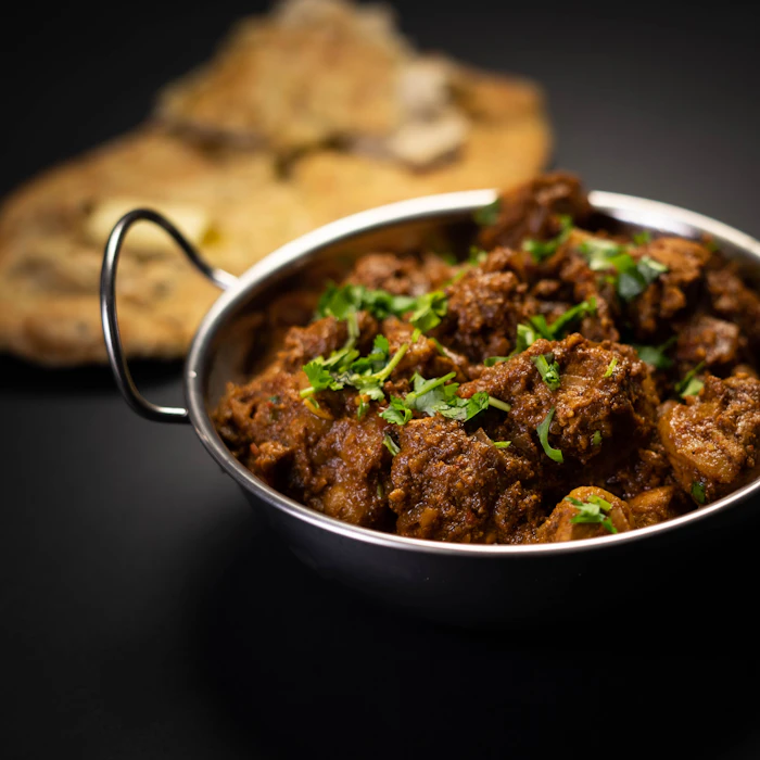 Deep red Kashmiri lamb rogan josh in a bowl
