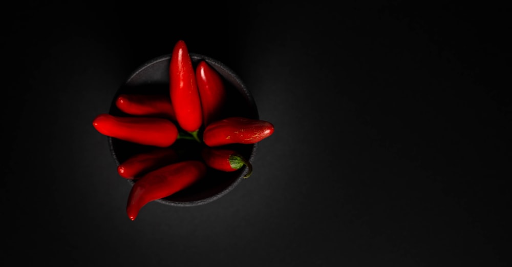 red chili on black bowl
