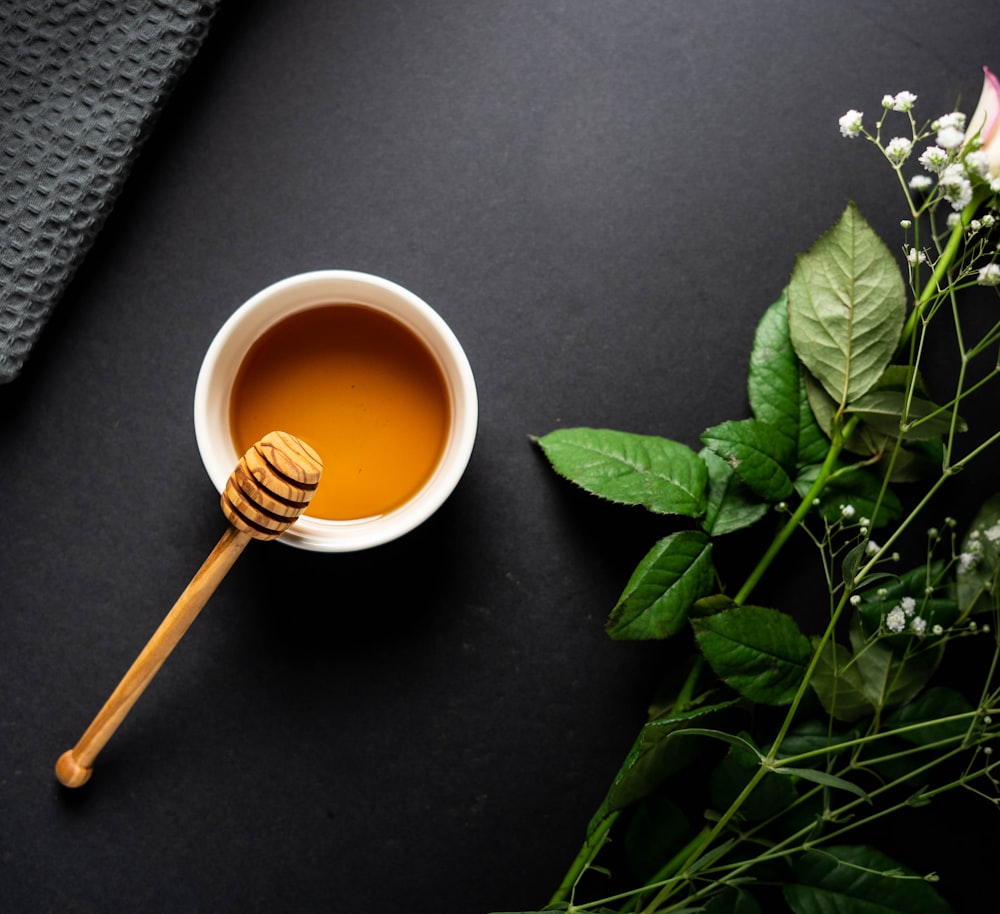 honey in bowl with honey deeper